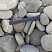 Kamenclub.ru: Галька речная плоская (серо-белая) фр. 70-120 мм. купить  в Воронеже галька галечник речной серый, белый окатанная плоская  природная галька 9000 руб/т   фото КАМЕНЬ КЛУБ